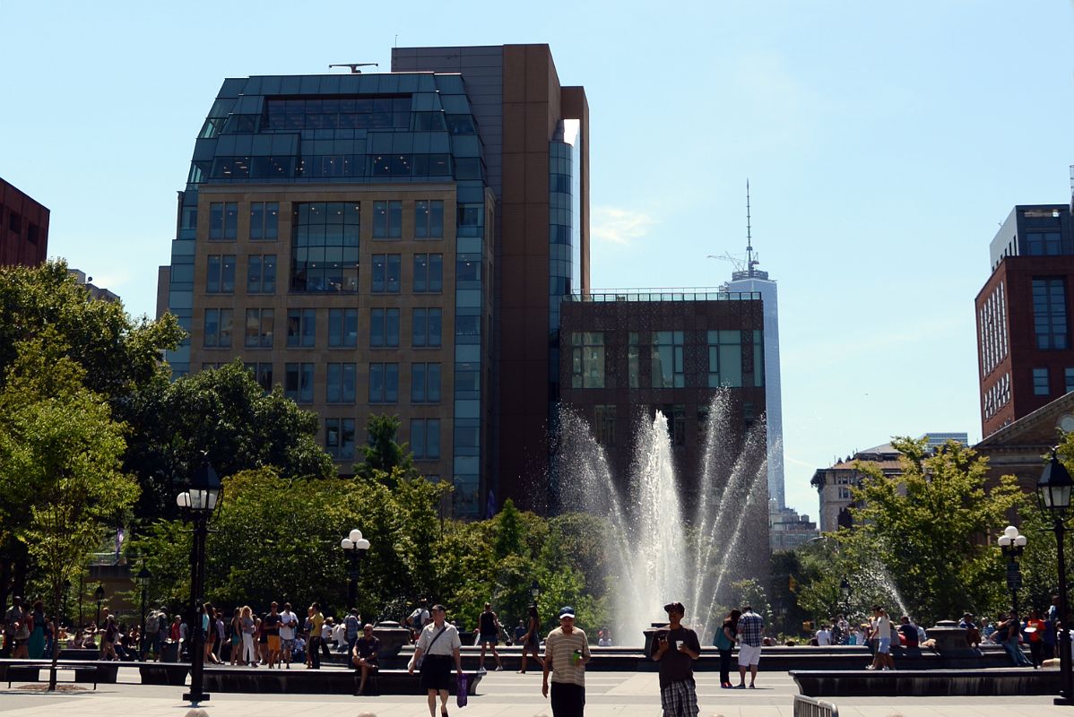 18-1 The NYU Kimmel Center for University Life With New York Washington Square Park Fountain And One World Trade Center